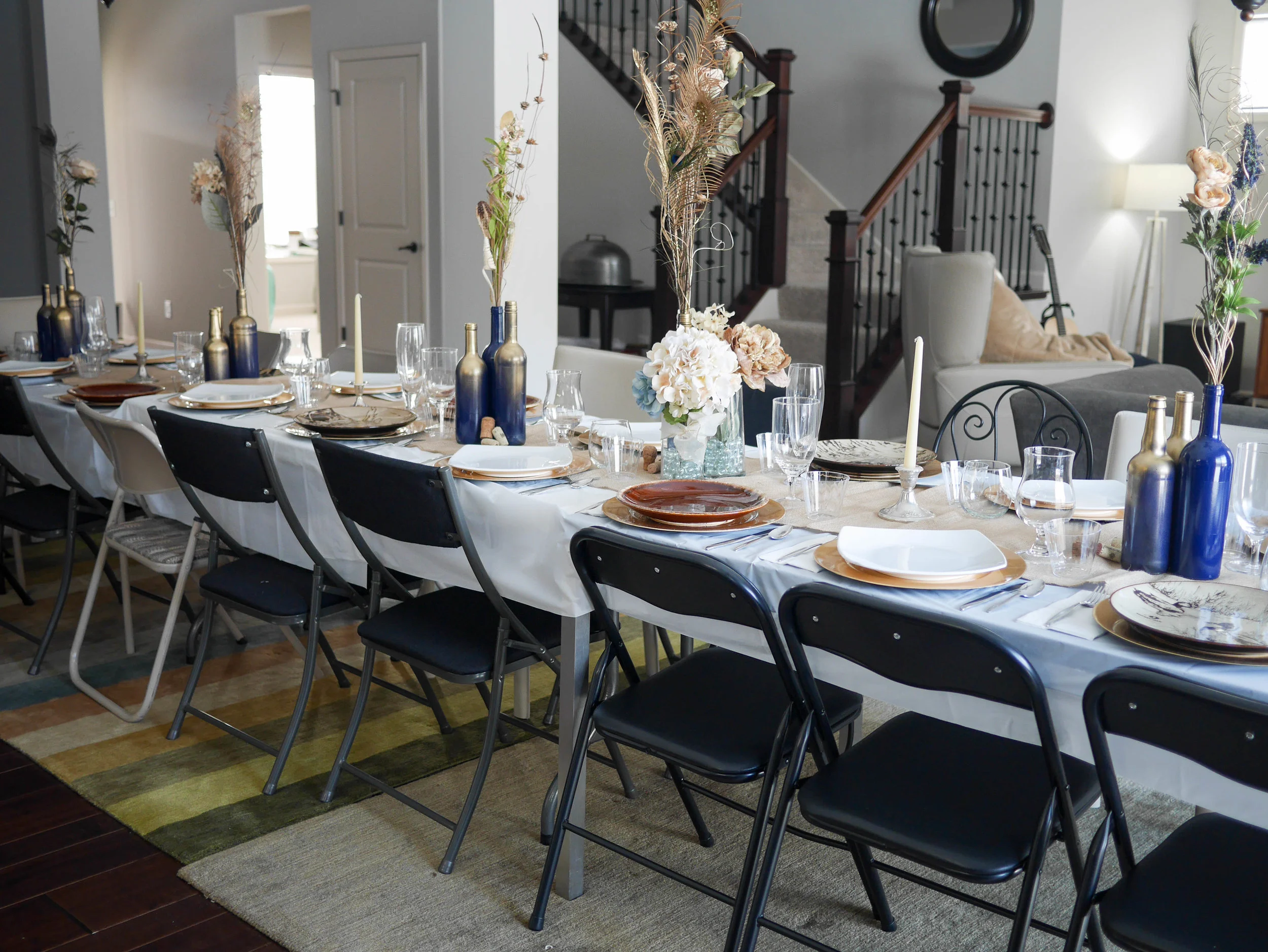 Set out chairs and place settings a day or two before your event to make sure you have enough! I had to mix and match glassware, plates and silverware but it got the job done.&nbsp;
