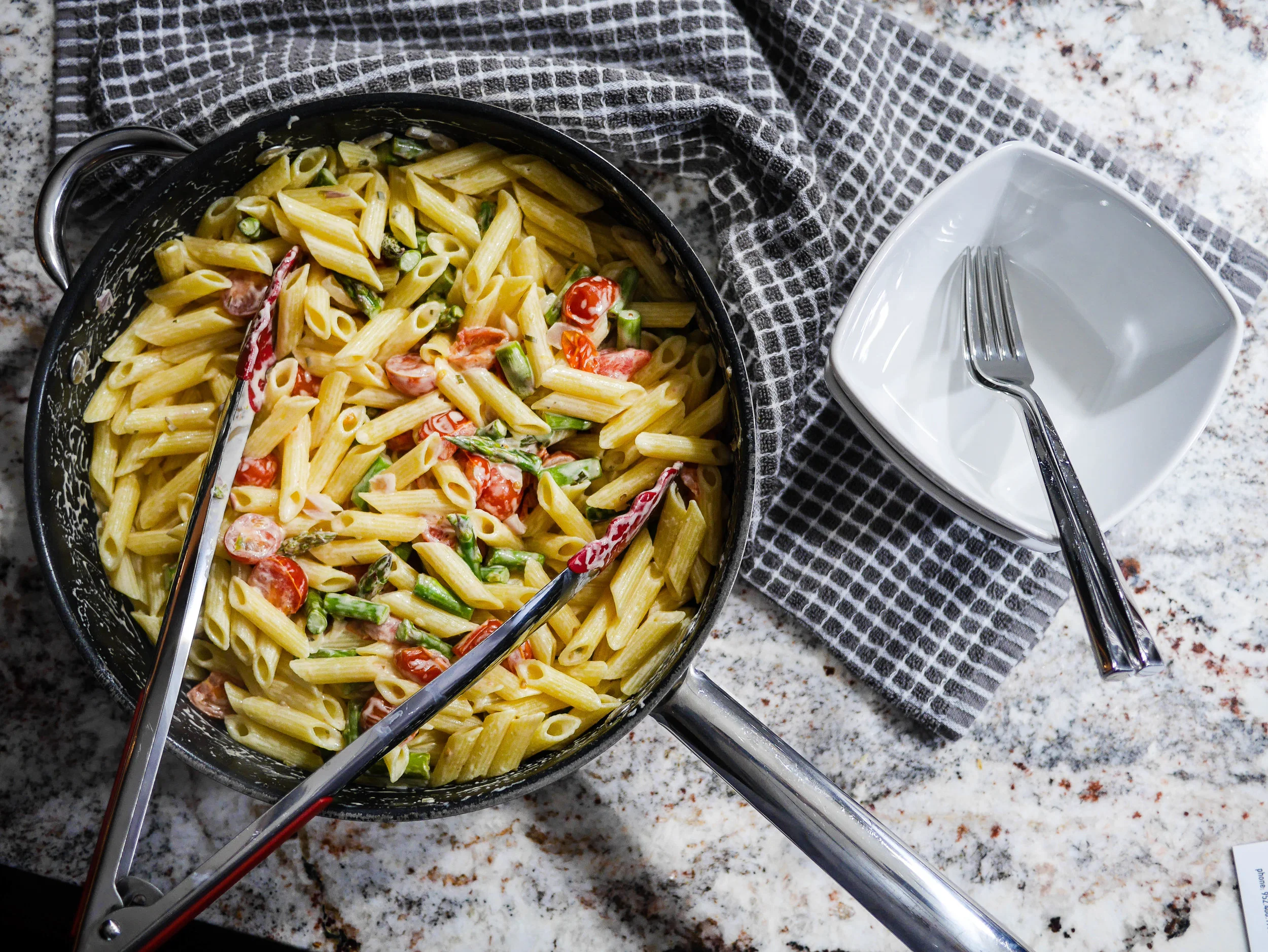 Ready in minutes and packed full of asparagus and tomatoes, this penne recipe is likely to make a weekly appearance in your house.