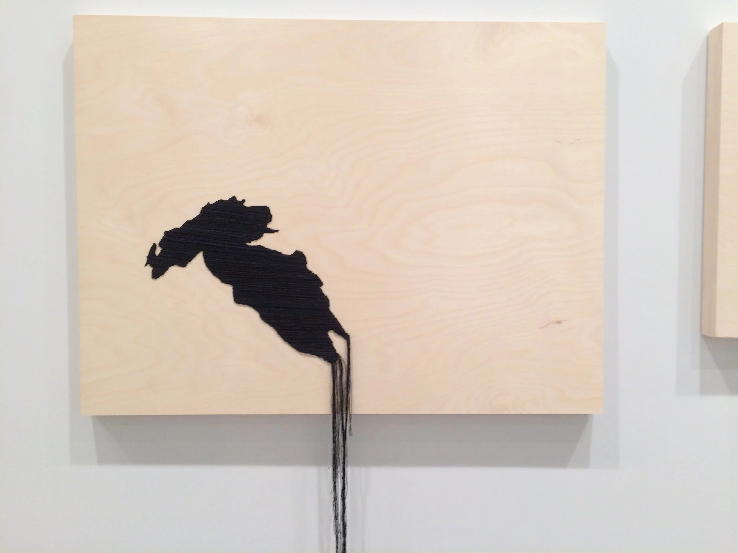 Orinoco, 2019. Embroidery on Wood Panel, 30” x 40”. Inspired by the recent uprisings and political upheval of Venezuela, I embroidered the country as an oil spill running off the side of the work, relating the country’s inherent sovereignty with the corporate greed which seeks to destroy it.
