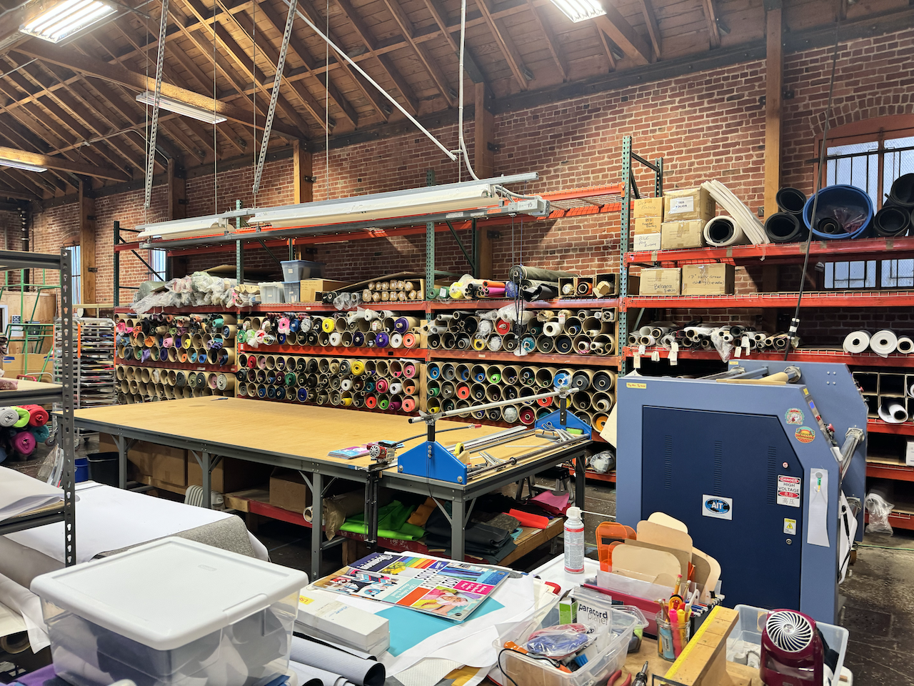  A shot of the big production table at the back of the Rickshaw Bagworks factory in the Dogpatch neigbhorhood of San Franciso. 