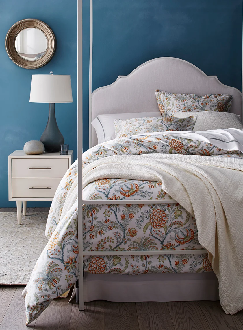 scottscharenbrioch_bedwithbluewall_poppycreativeagency.jpg