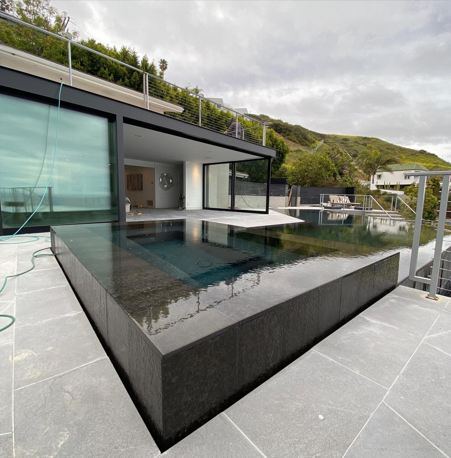Black swimming pool at Malibu project by JAGAR #comingsoon #construction #architecture