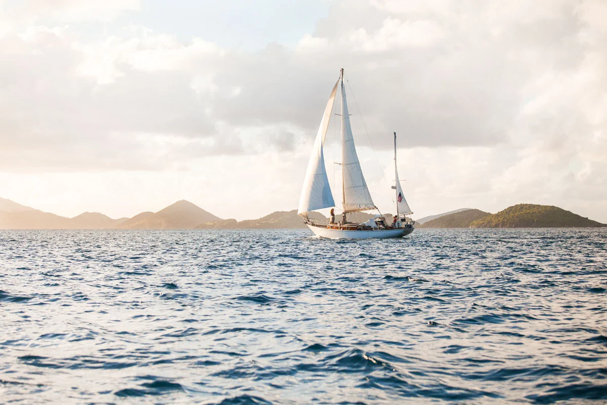 A hazy sky is the backdrop for Cimarron Yacht Charter's beautiful sailboat in St John USVI.