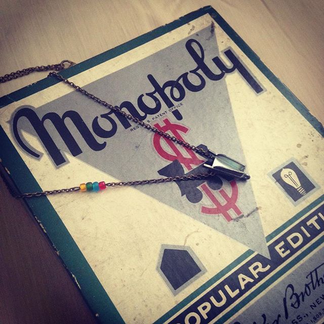 Any #Monopoly fans out there? This darling piece features a wheelbarrow and a few beads in bright bold property colors! Getting my inventory stocked for the party tomorrow! #amarisjewelry #shopsmall #repurposed #gamepiecejewelry #monopoly