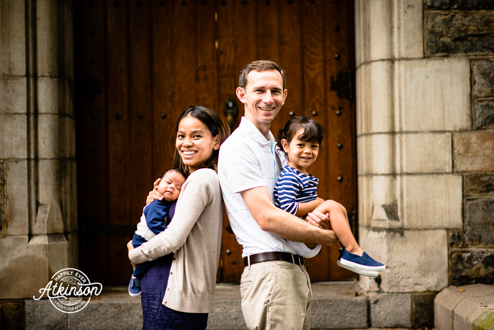 Family portrait in front of old doors
