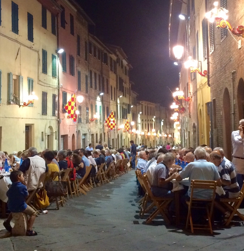 Contrada dinner on Via San Marco, August 15, the night before Palio. This is the street where I am currently living.