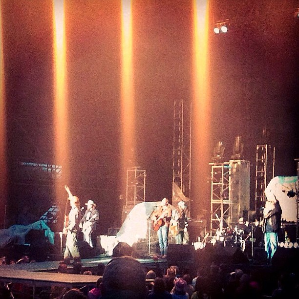 Been a hell of a summer, ladies and gentleman. We were priveleged with the opportunity to open up for the Allman Brothers Band and Steve Winwood at Meadowbrook in New Hampshire a few weeks ago, and Toby Keith at the Bangor Waterfront the week after that. Here's an instagram shot of the Toby Keith gig taken by our friend Sarah. It was raining but it was beautiful. Anyway the summer was unreal great but we're gearing up for fall. We have a few really cool gigs coming up to wrap up September, this Friday at the Arch Street Tavern in Hartford, CT and then a Common Ground Fair after party up in Unity, Maine on Saturday. Next weekend we'll be at the New England Americana Festival in Boston (read an interview with Will about the festival and about a bunch of other stuff on the R ed Line Roots blog here ), followed by an awesome party in Maine on Saturday at the Wolfe's Neck Farm in Freeport. Get there early because there will be a square dance before we go on. We'll be partaking, you bet. October brings some heavy road-tripping; we'll be doing a 5-week swing out through Colorado, down to Texas, back through Tennessee and have a ton of great gigs in between. One of them is a co-bill with Luke and Will's old man David Mallett at the legendary Bluebird Cafe in Nashville, another is at the equally legendary Birchmere in Alexandria, VA opening up for a killer band called the Turnpike Troubadours. Another is at the equally legendary Continental Club in Austin, which we hit up last time we were in Austin to check a set by one of our heroes, James McMurtry. Good stuff. We'll also be recording a couple new tracks when we're in Nashville with a Grammy Award Winning engineer/producer named Rich Adler , and we couldn't be more thrilled about it. We're brainstorming some cool ways to release these and a couple other tracks we have waiting in the wings, so stay tuned. Much love to you all, thanks so much for all the support and for making it possible to keep this train a-runnin'. Means the world to us. Catch you down the road, TMBB