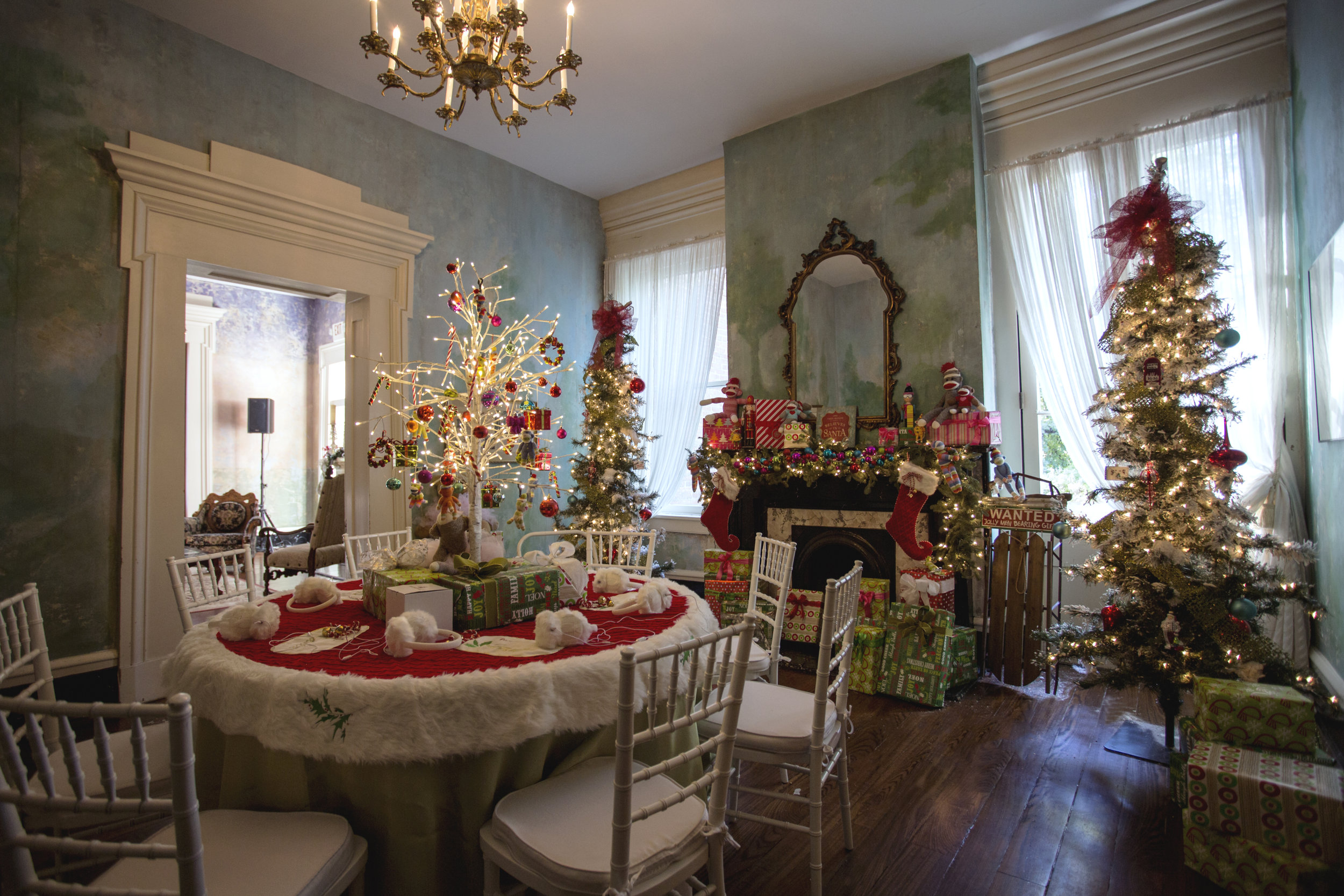 Downstairs, party guests were able to listen to Musgraves' upcoming Christmas album, "A Very Kacey Christmas" at a table set up with seven white fluffy earmuff headphones. Photo: Angelea Decor: Balsam Hill