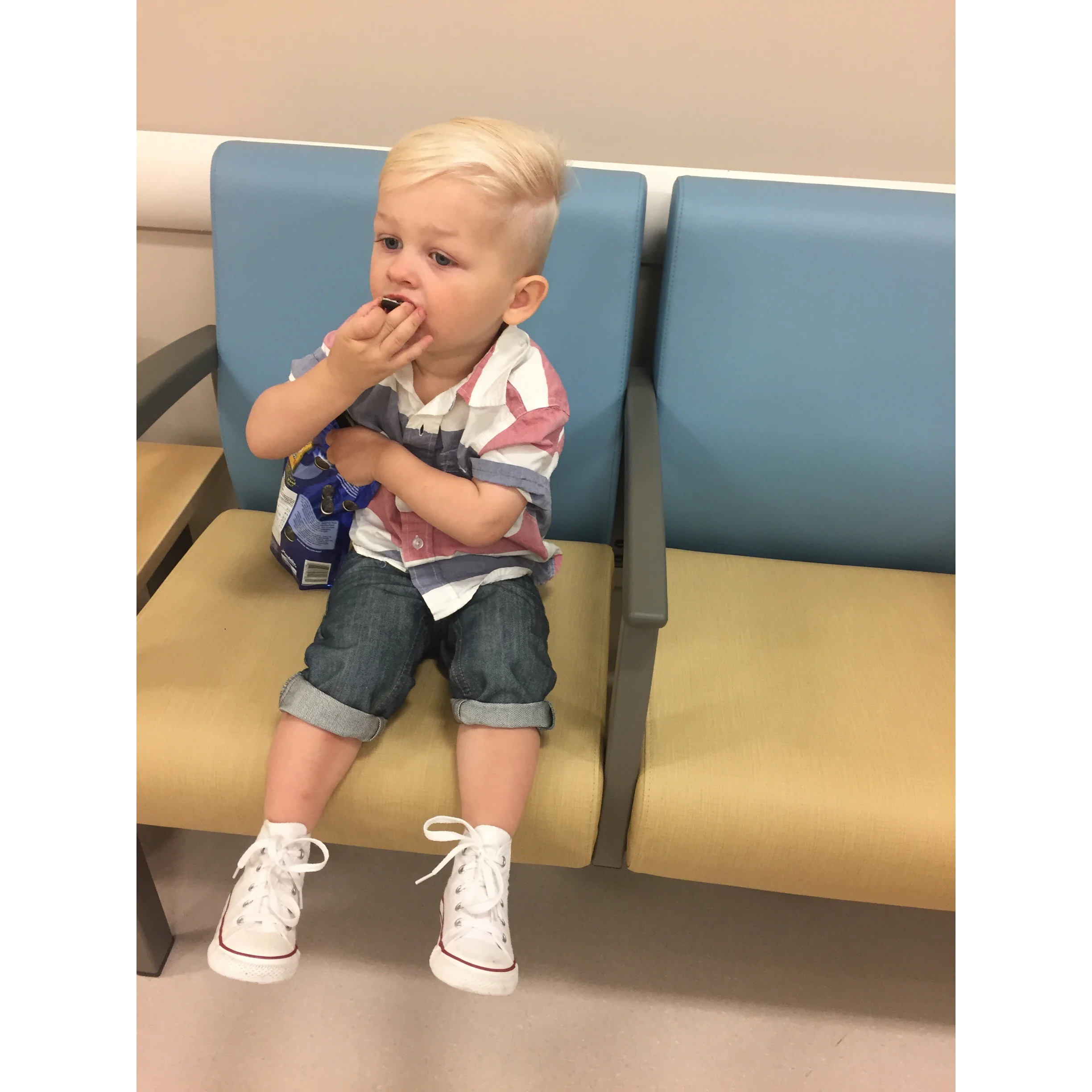 Today at the docs office, keeping him occupied with a bag of mini oreos!
