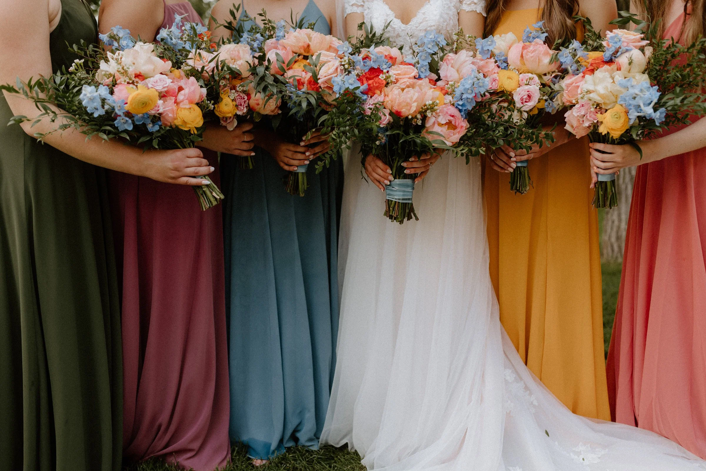 Bridesmaids dresses with flowers.jpg
