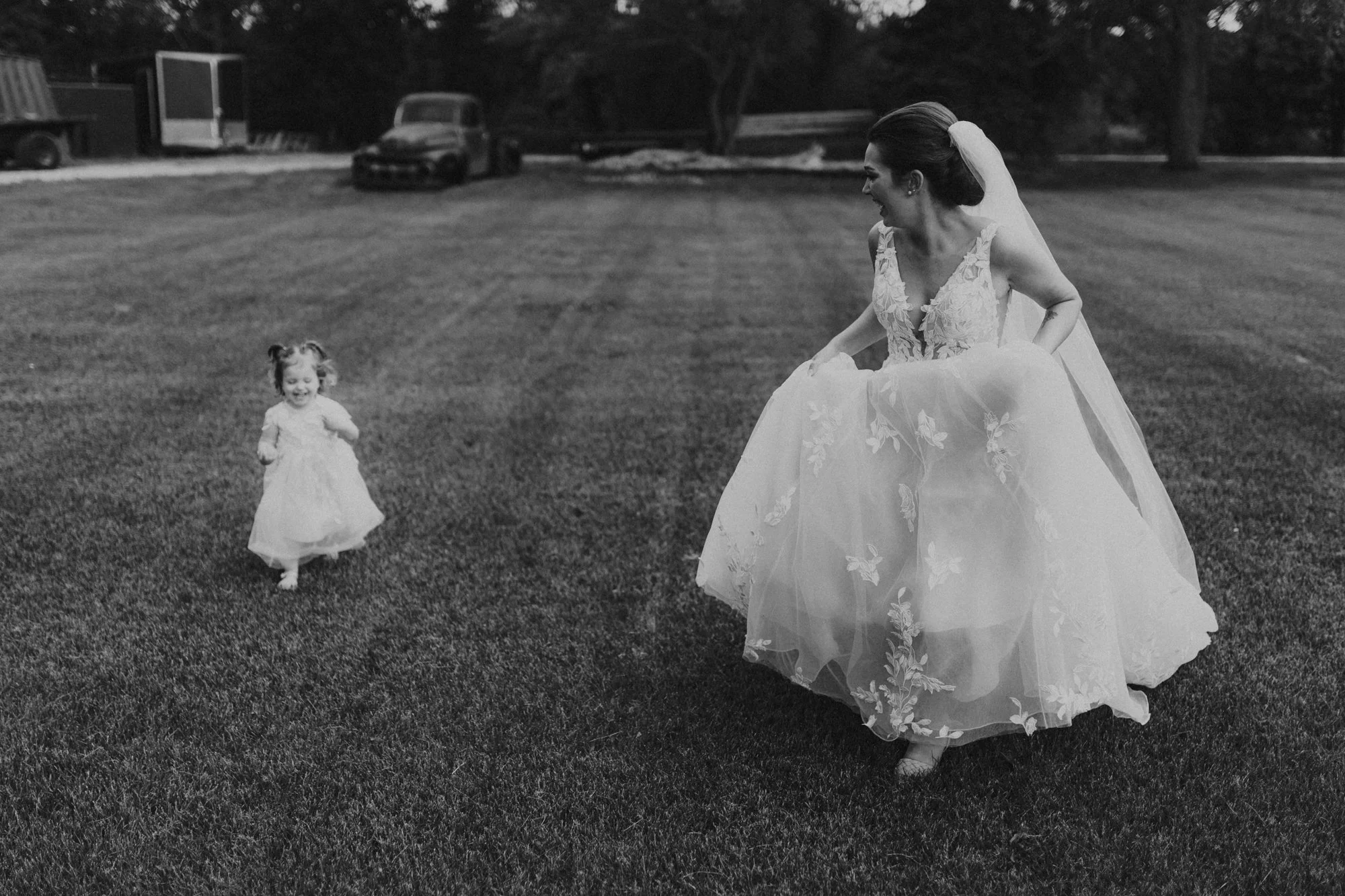 Bride running with her daughter.jpg