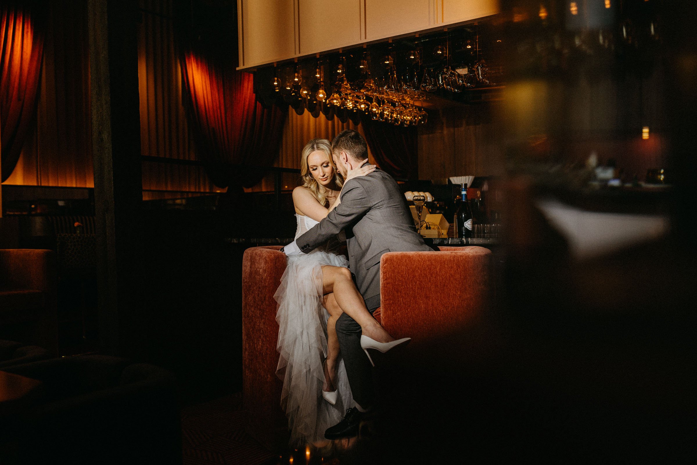 Wedding couples sitting at the bar.jpg