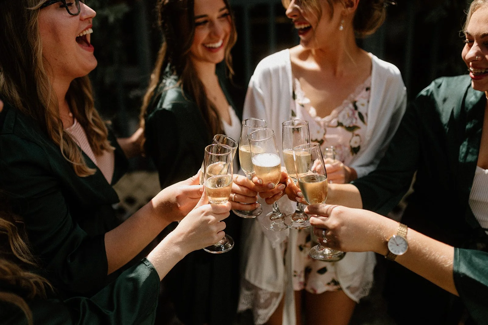 Bridesmaids drinking champagne.jpg