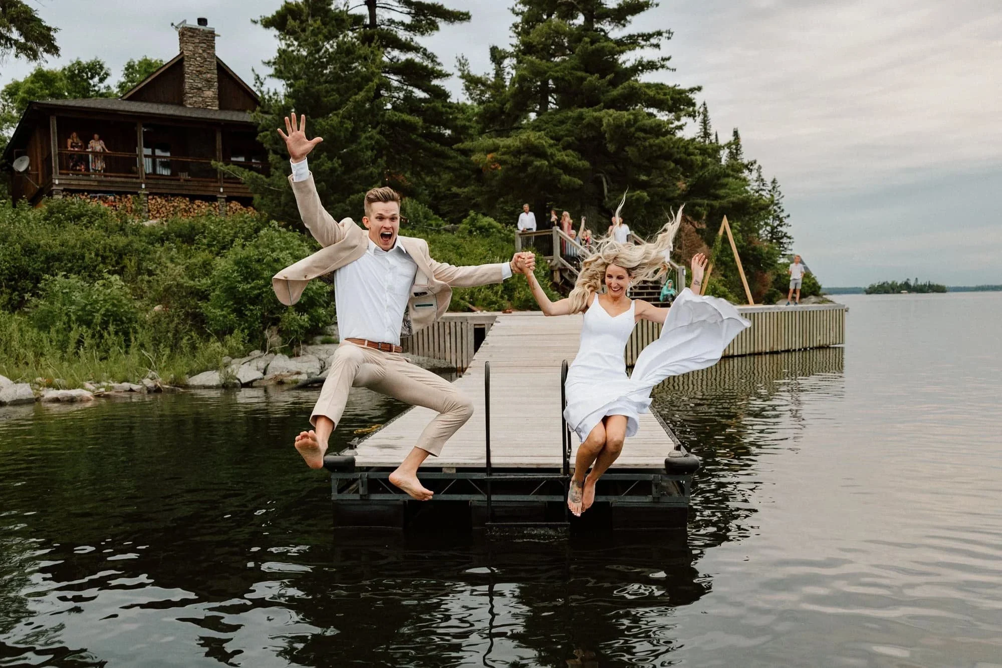 lake-wedding-dock-jump-couple-manitoba.jpg
