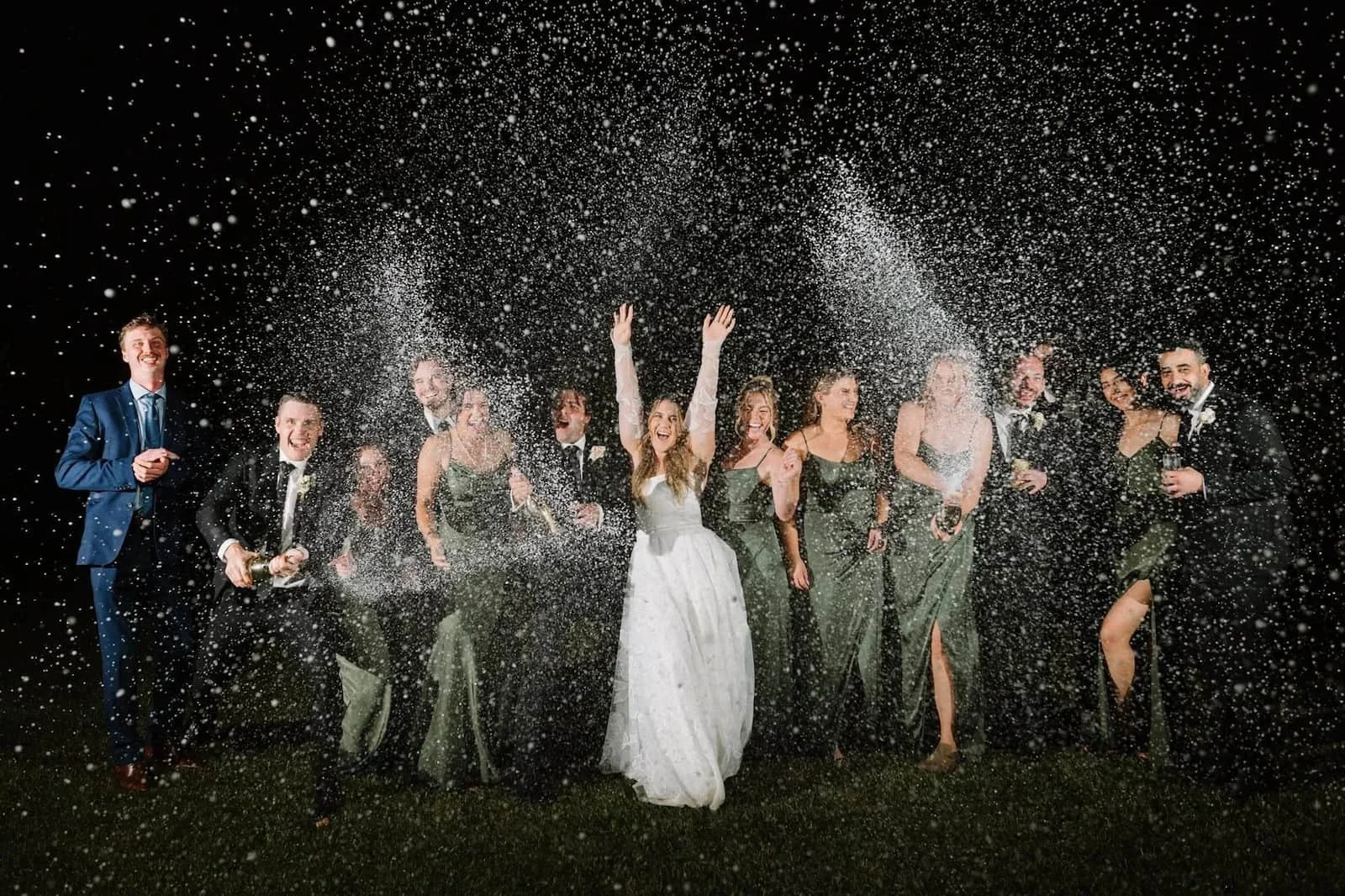 wedding-party-champagne-spray-night-celebration.jpg