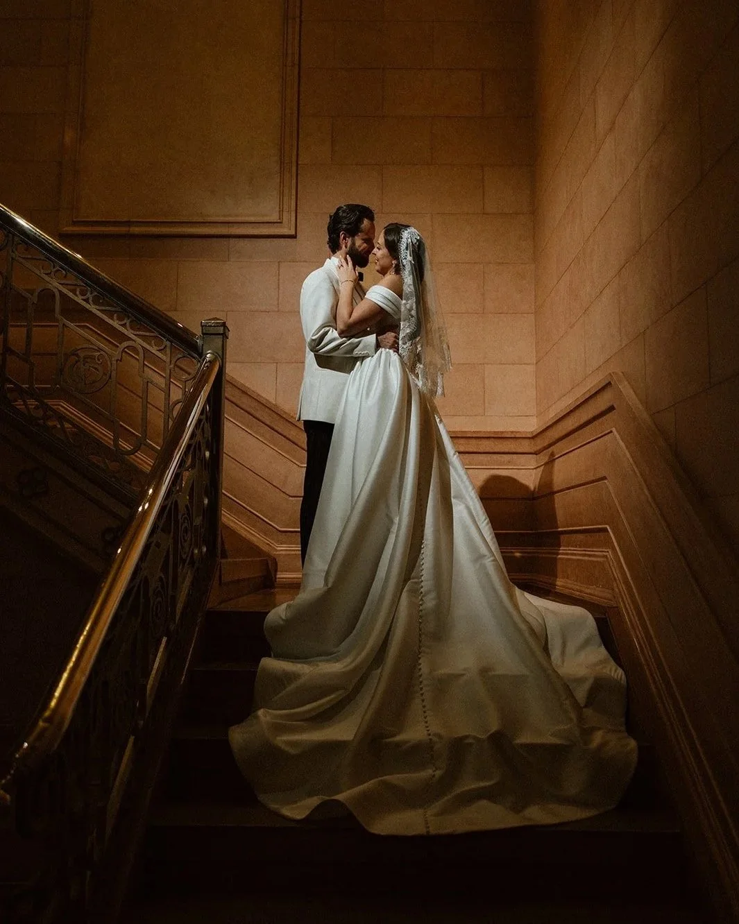  Bride and groom portrait on the staircase inside the Fort Garry Hotel in Winnipeg 