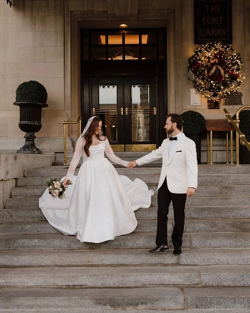  Bride and groom on the front steps of the Fort Garry Hotel in Winnipeg 