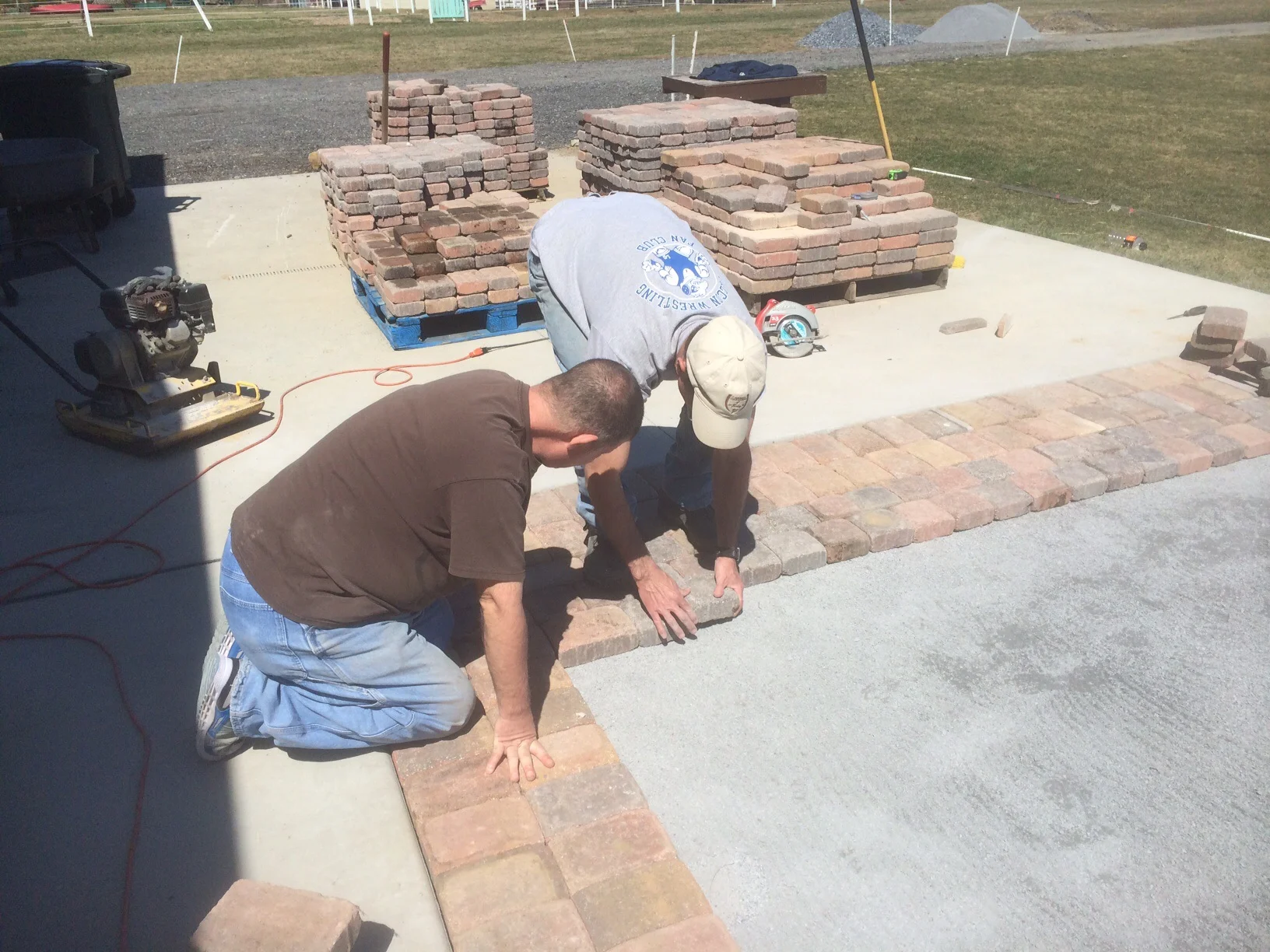Rick and Chris laying the first courses.