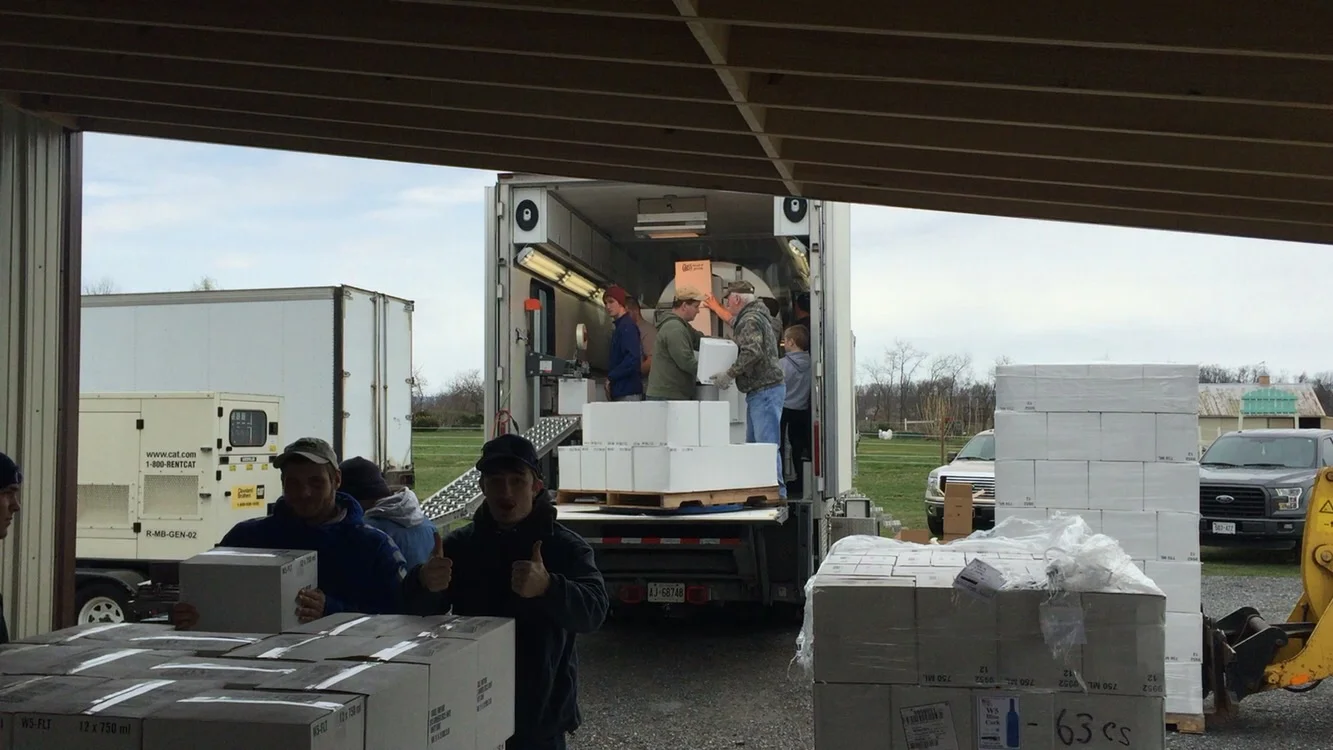The new truck and bottling crew.