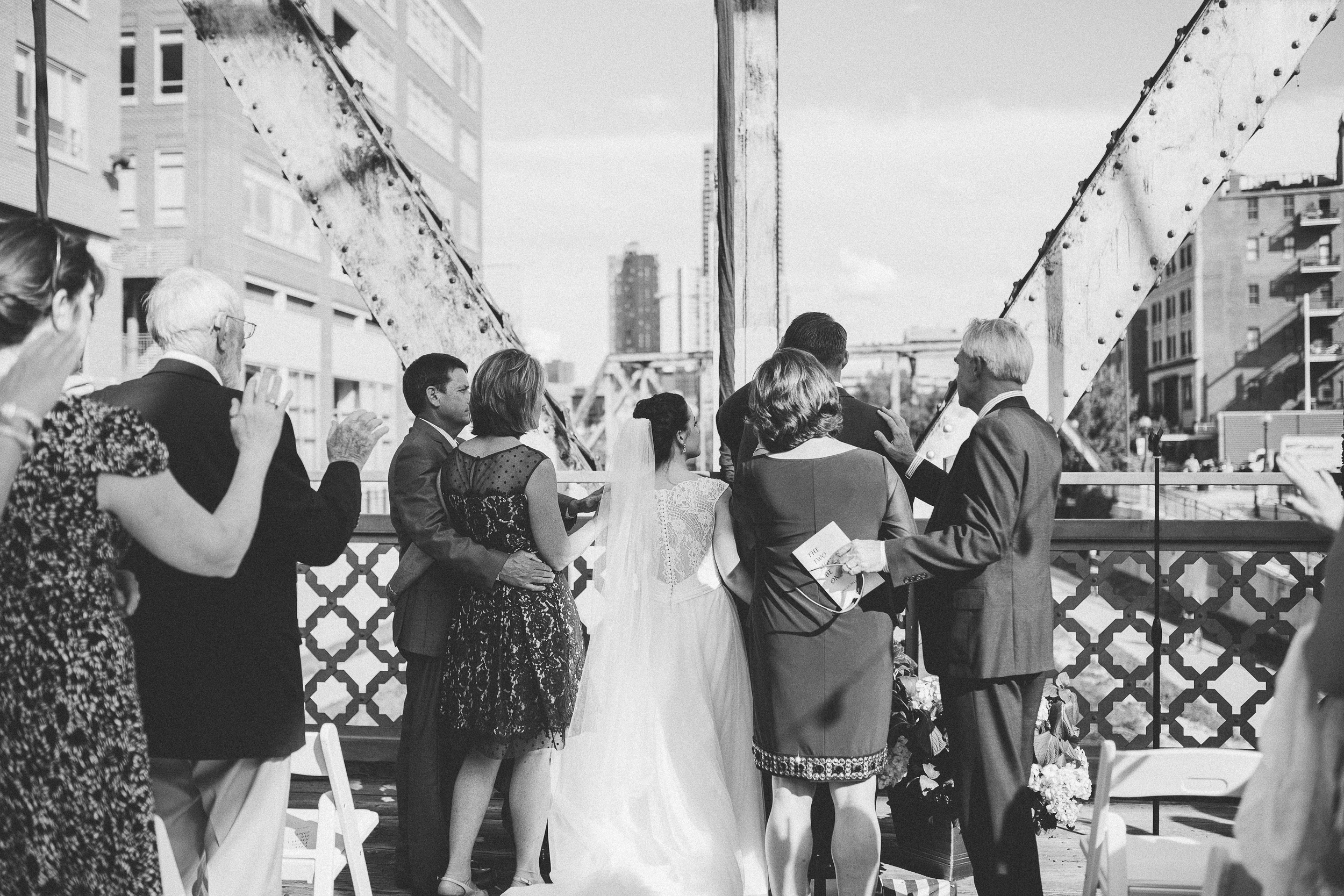 Coohills Wedding Photographer - parents praying over bride and groom