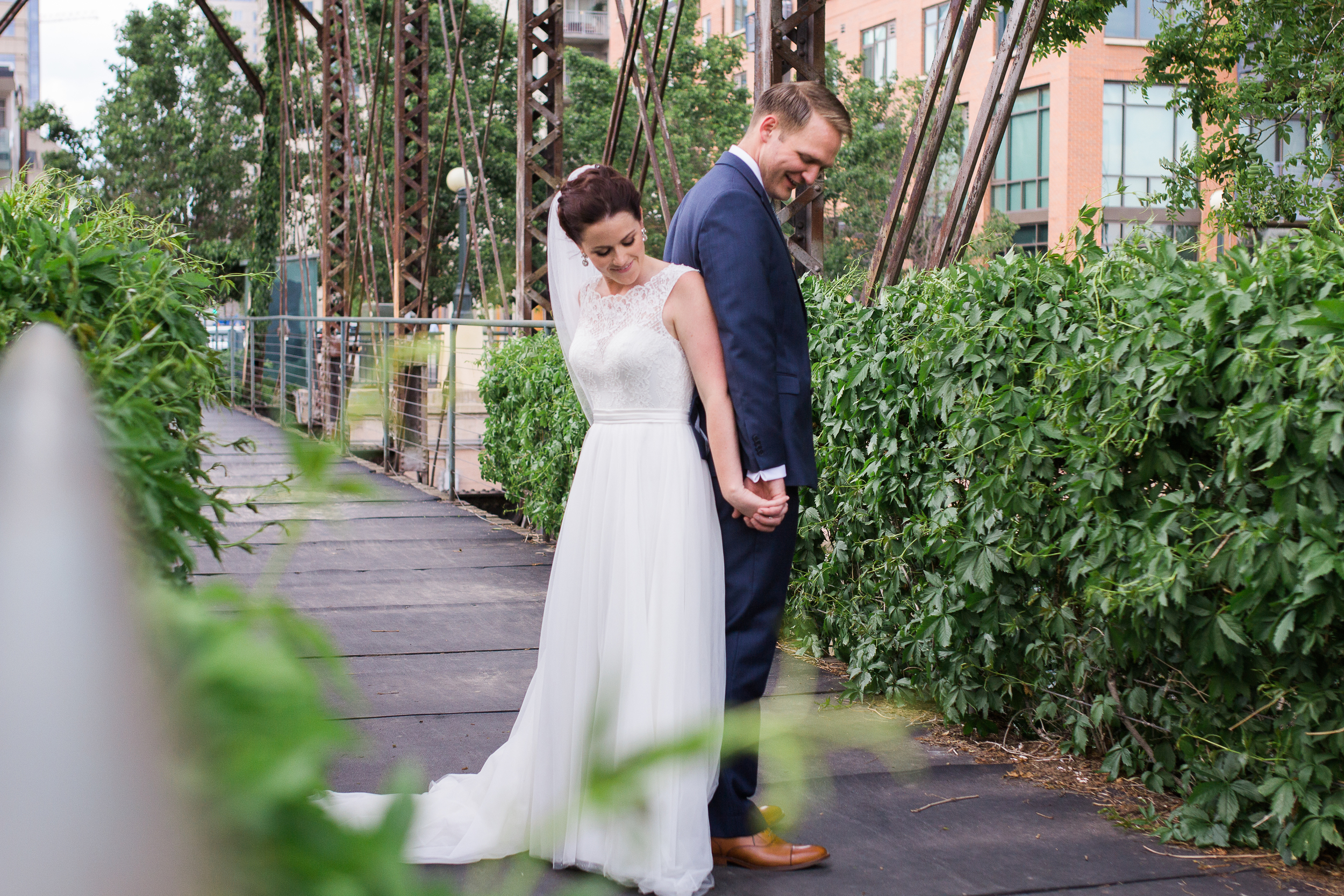 Coohills Wedding Photographer - bride and groom on bridge
