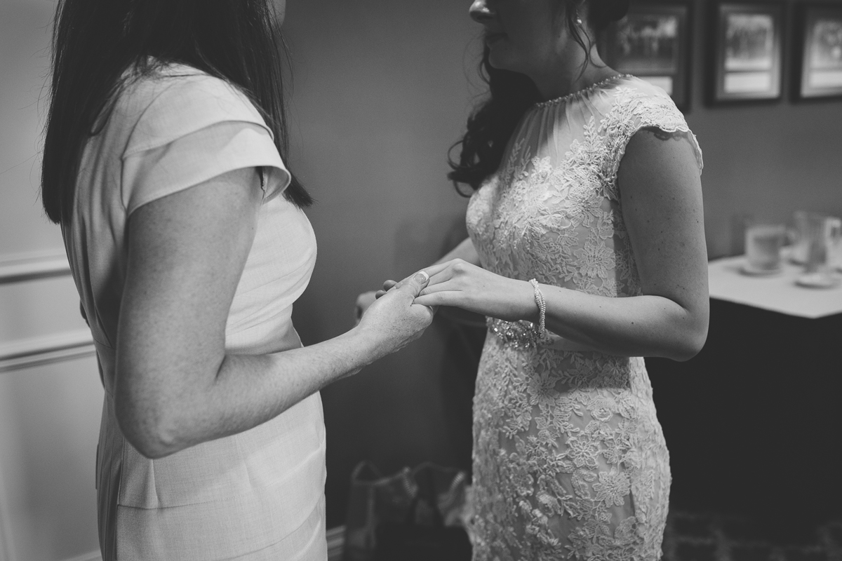 mom and bride before wedding - Thompson Center at UNO wedding