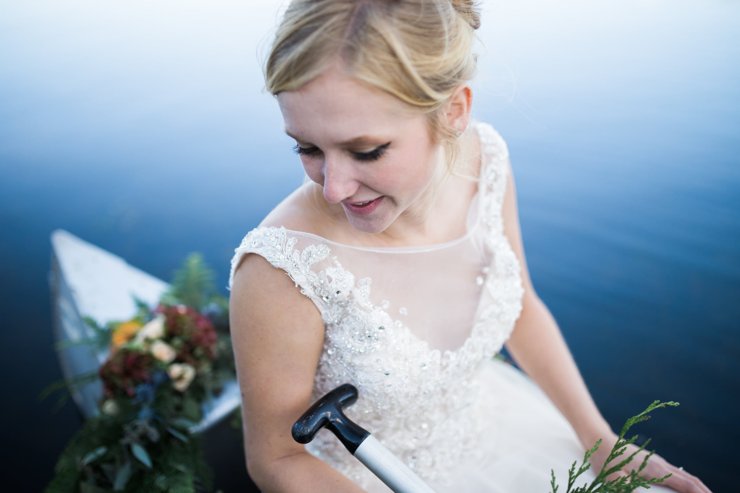 Colorado Mountain Wedding Photographer - bride with canoe paddle