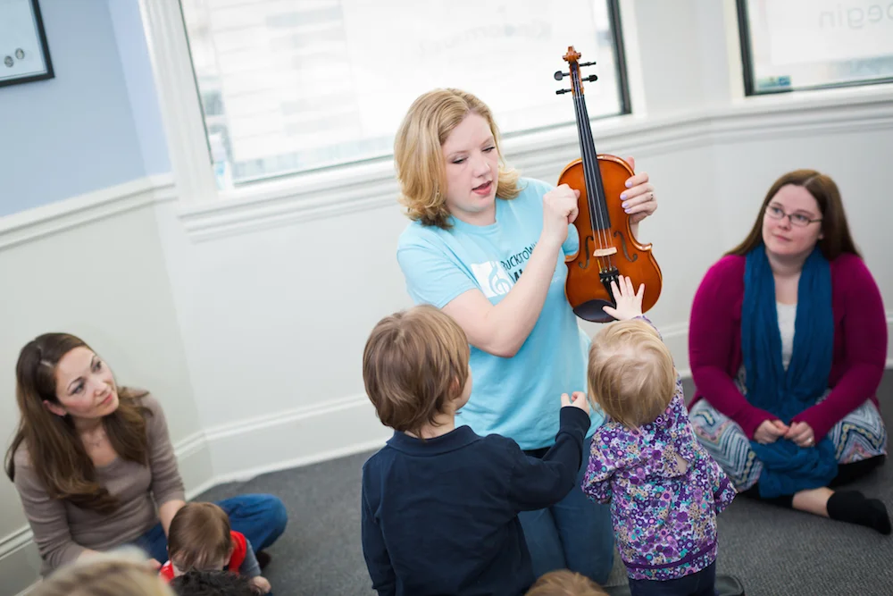 Jessica leading a Kindermusik class