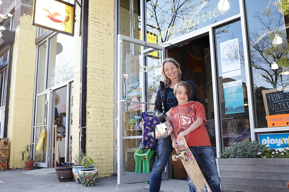 Kate and Harry outside Flying Squirrel, on a still low-slung strip of Greenpoint's Oak Street.
