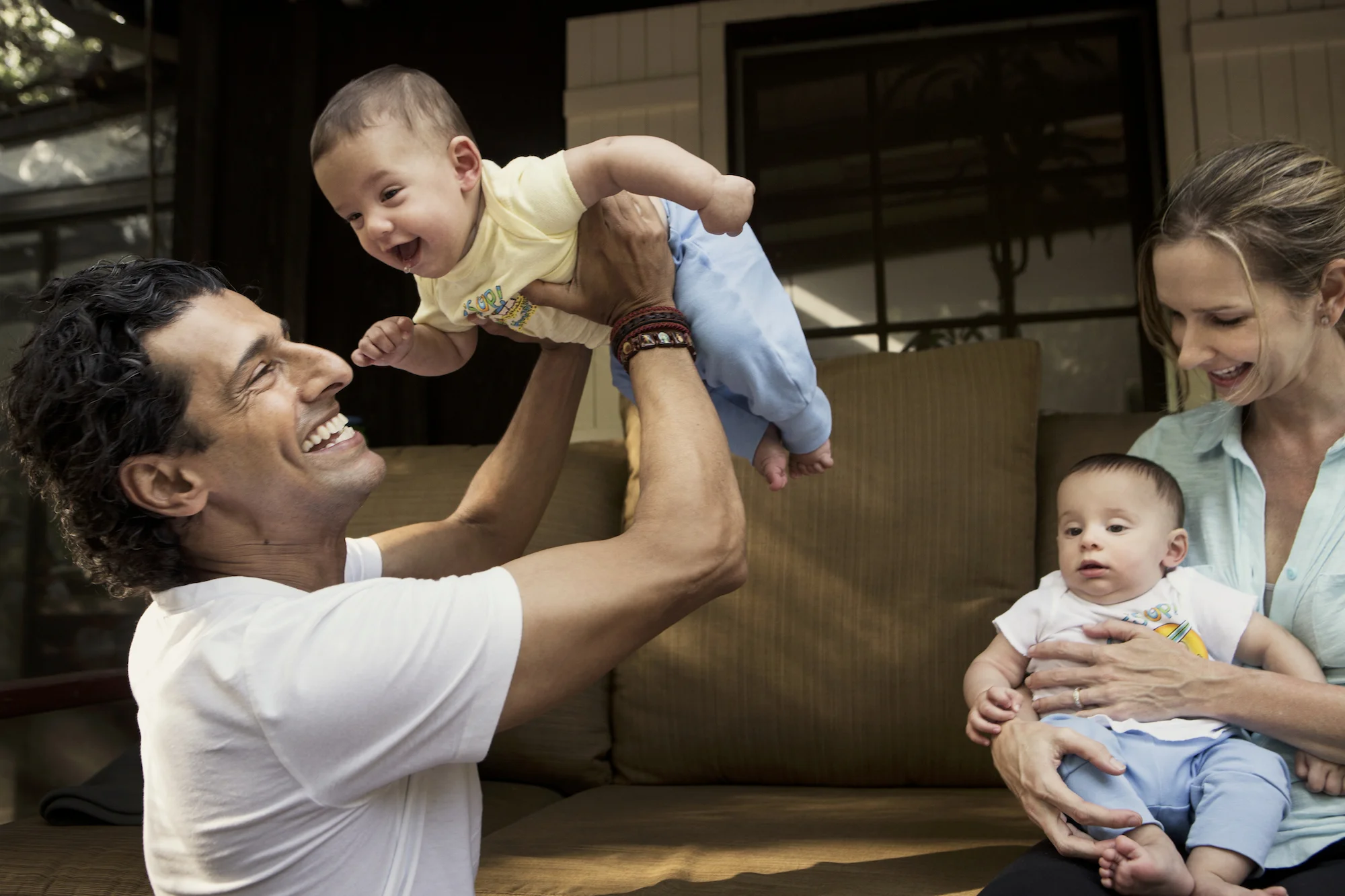 Kiran and MeiMei with twins, taj and zidan, at home in topanga, california