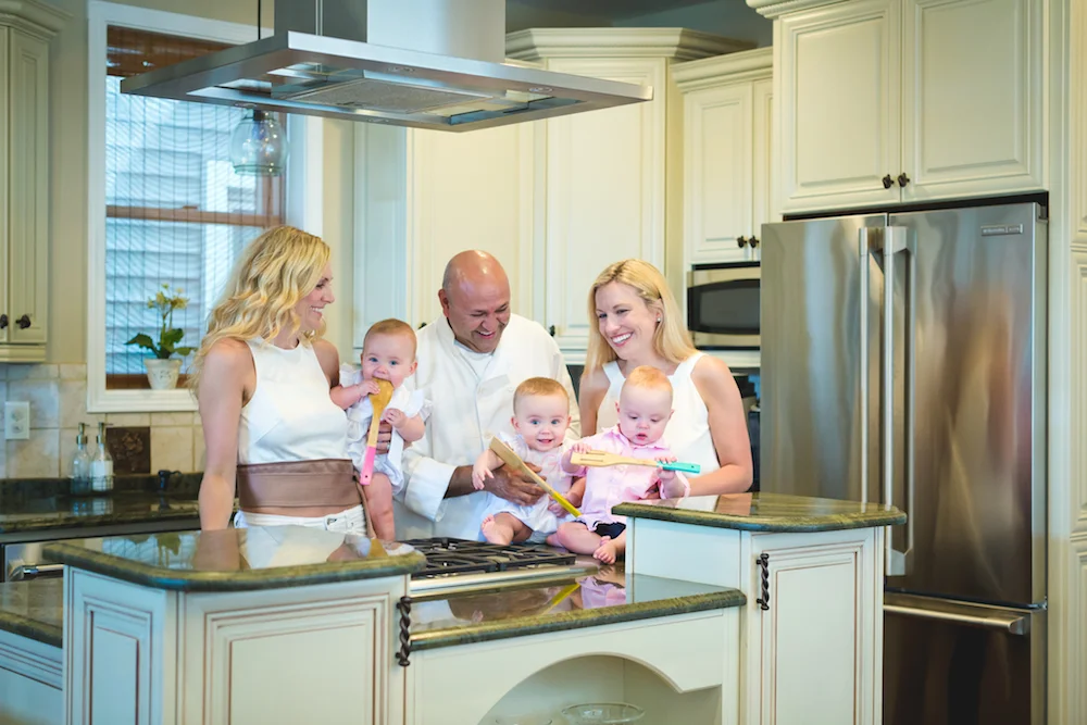 The Garrison family with chef naveen