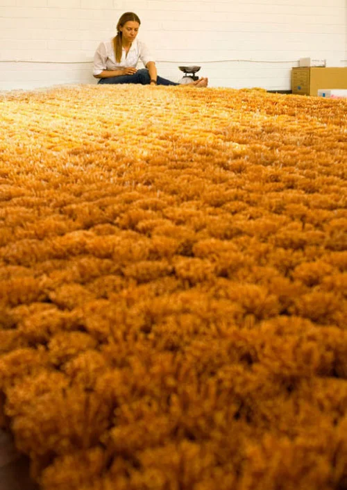 Liza Lou artist from New York. Liza working on Gather (One million)