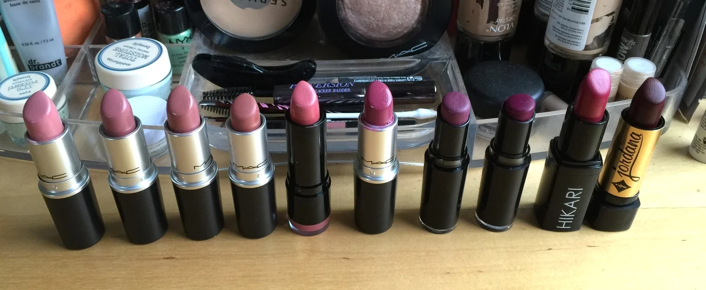 Shown from left to right are Mac creme cup, Mac Faux, Mac modesty, Mac velvet teddy, NYX Tea Rose, mac plumful, Wet and wild Ravin' Raisin, wet and wild sugarplum fairy, Hikari Cabernet, Jordana Eggplant.