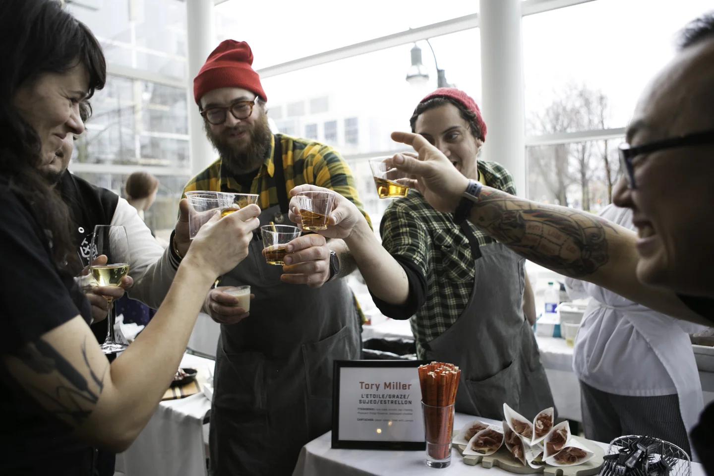 Local celebrity chef, Tory Miller, toasts to Chef Week with his employees. Miller was recently nominated for what would be his second James Beard Award.