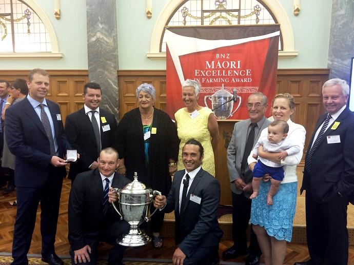 Ngāi Tahu Farming staff in Wellington for the announcement of Ahuwhenua finalists. Back row, from left: Ngāi Tahu Farming CEO Andrew Priest, General manager, Ngāi Tahu Farming Dairy, Shane Kelly, Mana Whenua Clare Williams, Stakeholder Engagement Specialist Kim Manahi, Mana Whenua Lik Dawson, Catherine Dawson and baby Taituha, Ngāi Tahu Farming Board Chair Gill Cox. Front row, left, finalist Rod Lamb, Te Ahu Patiki and finalist Hemi Dawson, Maungatere.