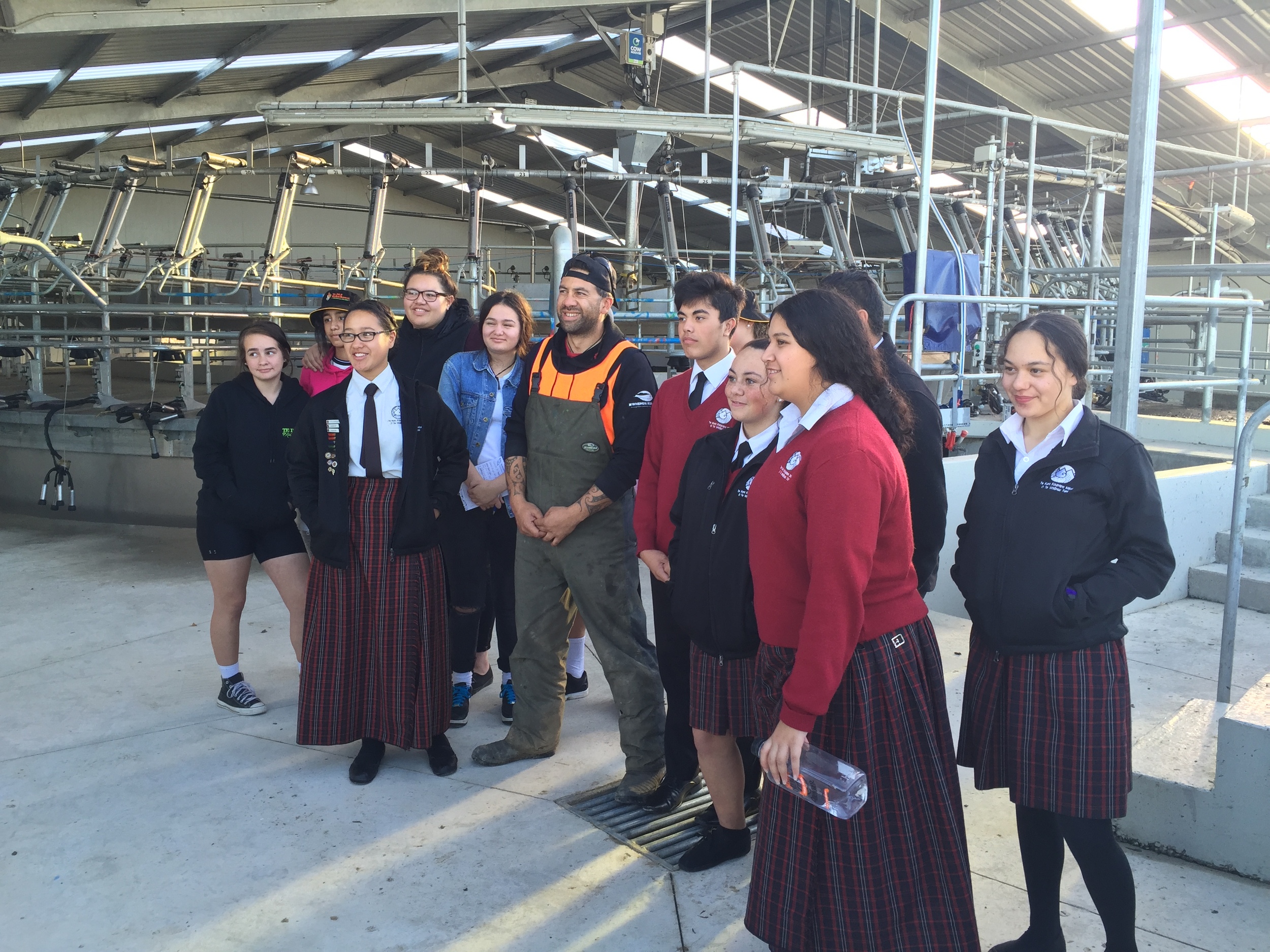 The rangatahi from Te Kura Kaupapa Māori o Te Whānau Tahi and Te Pa o Rakaihautu with Chris Eruera (Ngāi Tahu), at Ngāi Tahu Farms, in Eyrewell