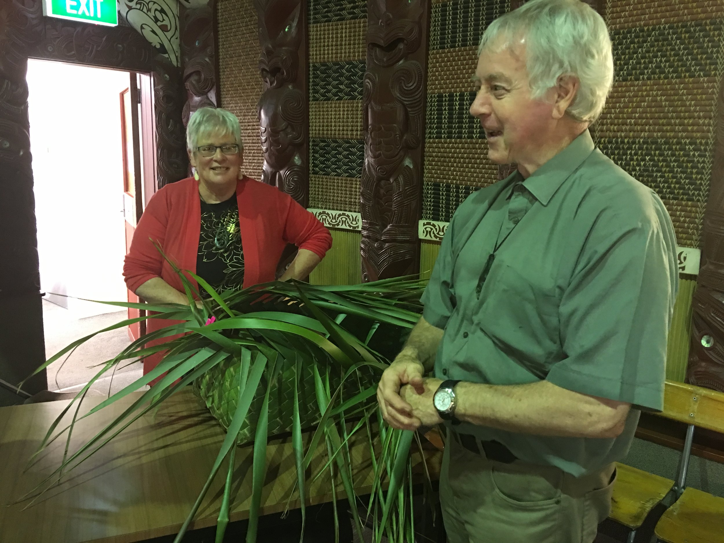 Taua Daphne and Cavan O'Connell at the Mokopuna Ora seminar at Rehua Marae. At the conclusion of the hui, the wahakura created by a number of weavers during the hui was presented to Henrietta Latimer, Manager of Rehua