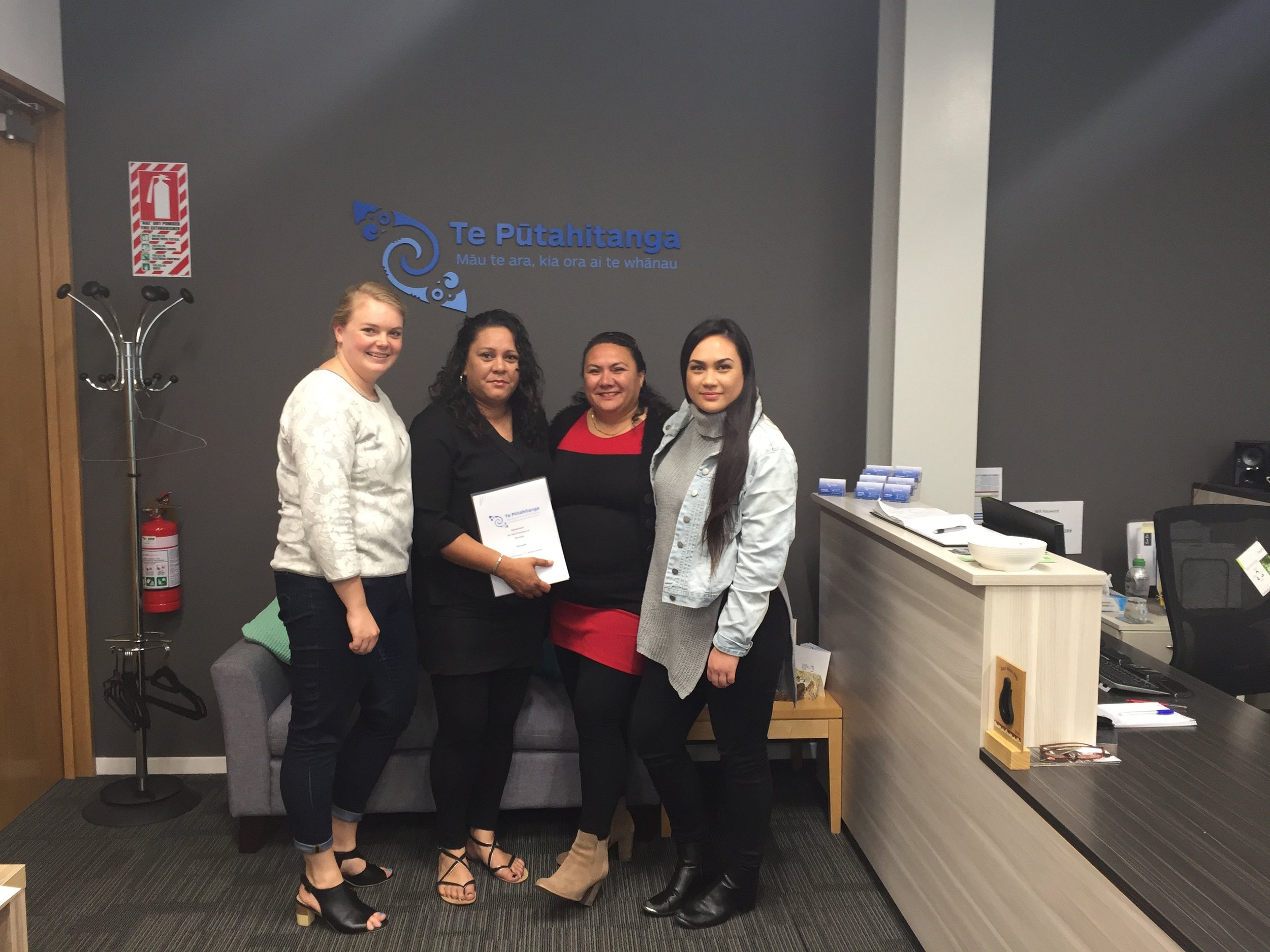 Alice Matheson (L) and Rongo Baker ( R) from Te Pūtahitanga o Te Waipounamu with Amy Burke and Tania Mulvaney from Help for the Homeless after signing their contract on Friday.