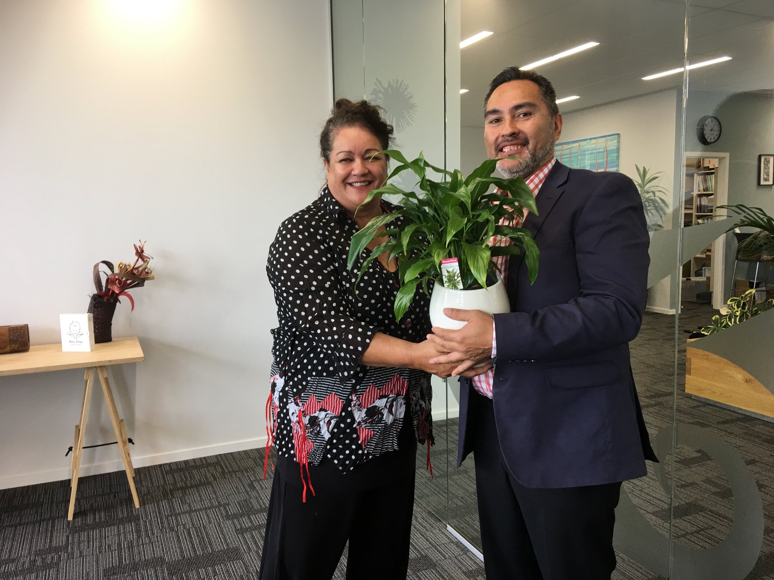 Trisha Harrison-Hunt gifting David Ormsby with the ‘peace lily