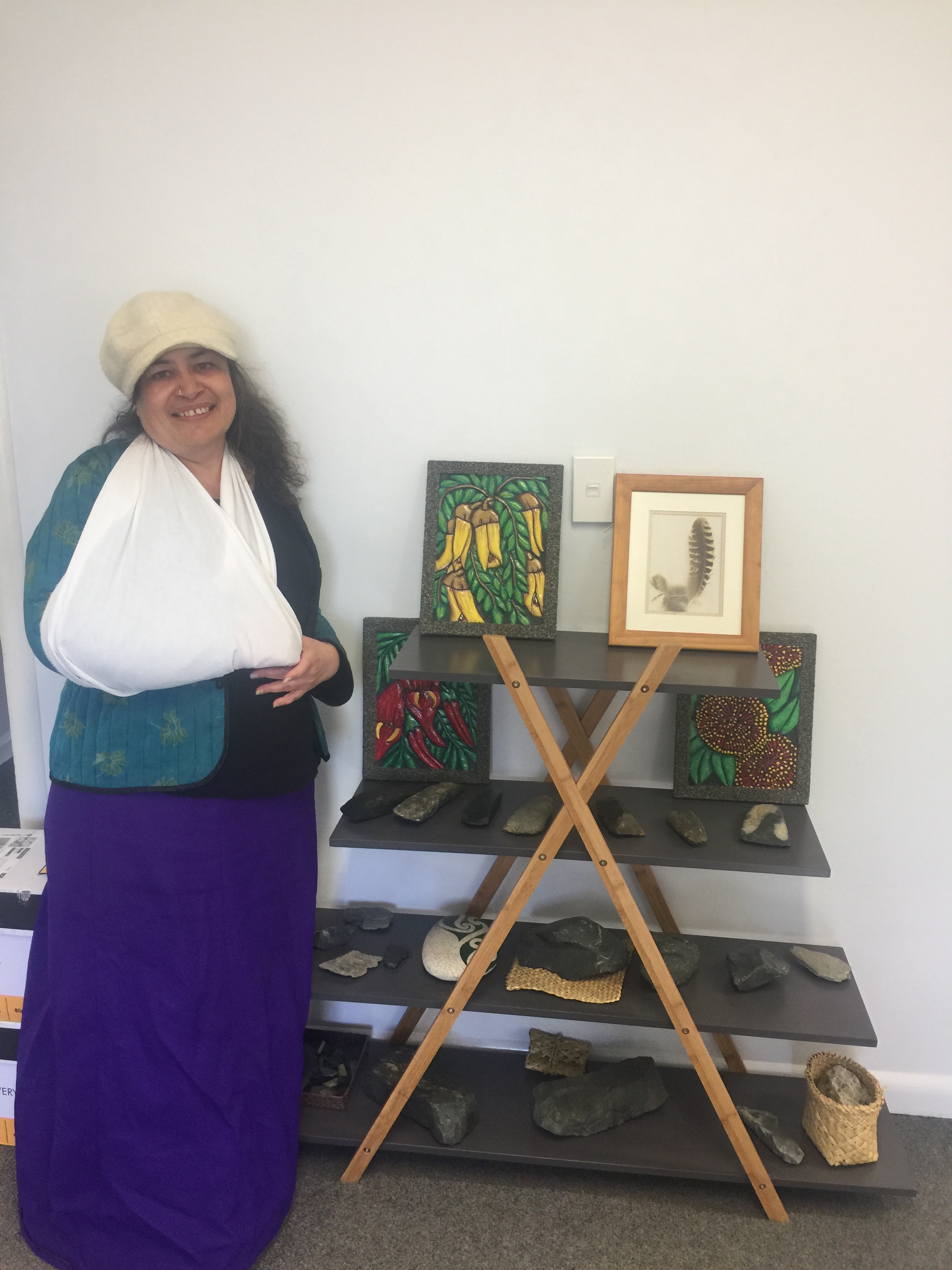 Noel Hemi with some of her artwork