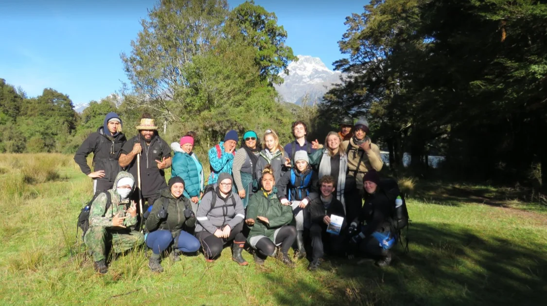 Rangatahi pictured at the Pike hut with Mount Madeline in the background. May,