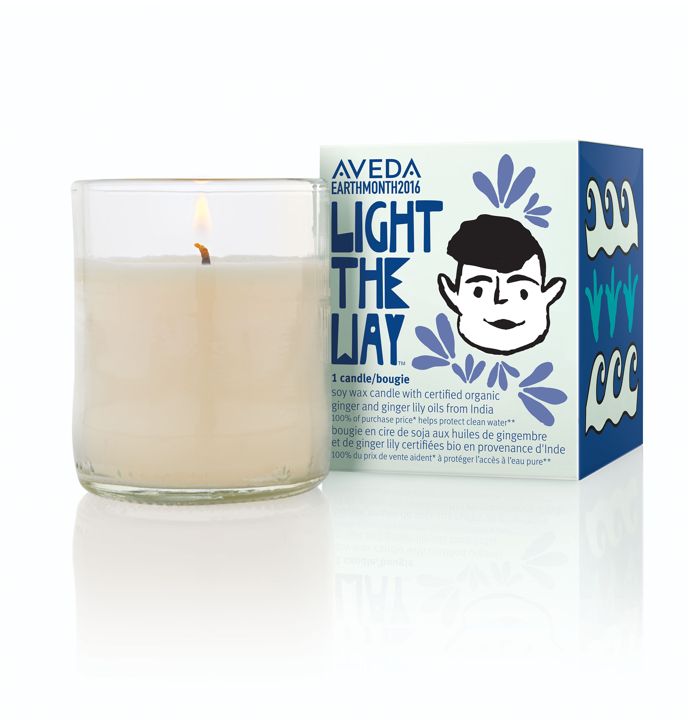 Soy wax candle with certified organic ginger and ginger lily oils from India; 100% of purchase price helps protect clean water