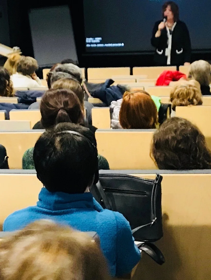 Nancy speaking at Auschwitz.jpg