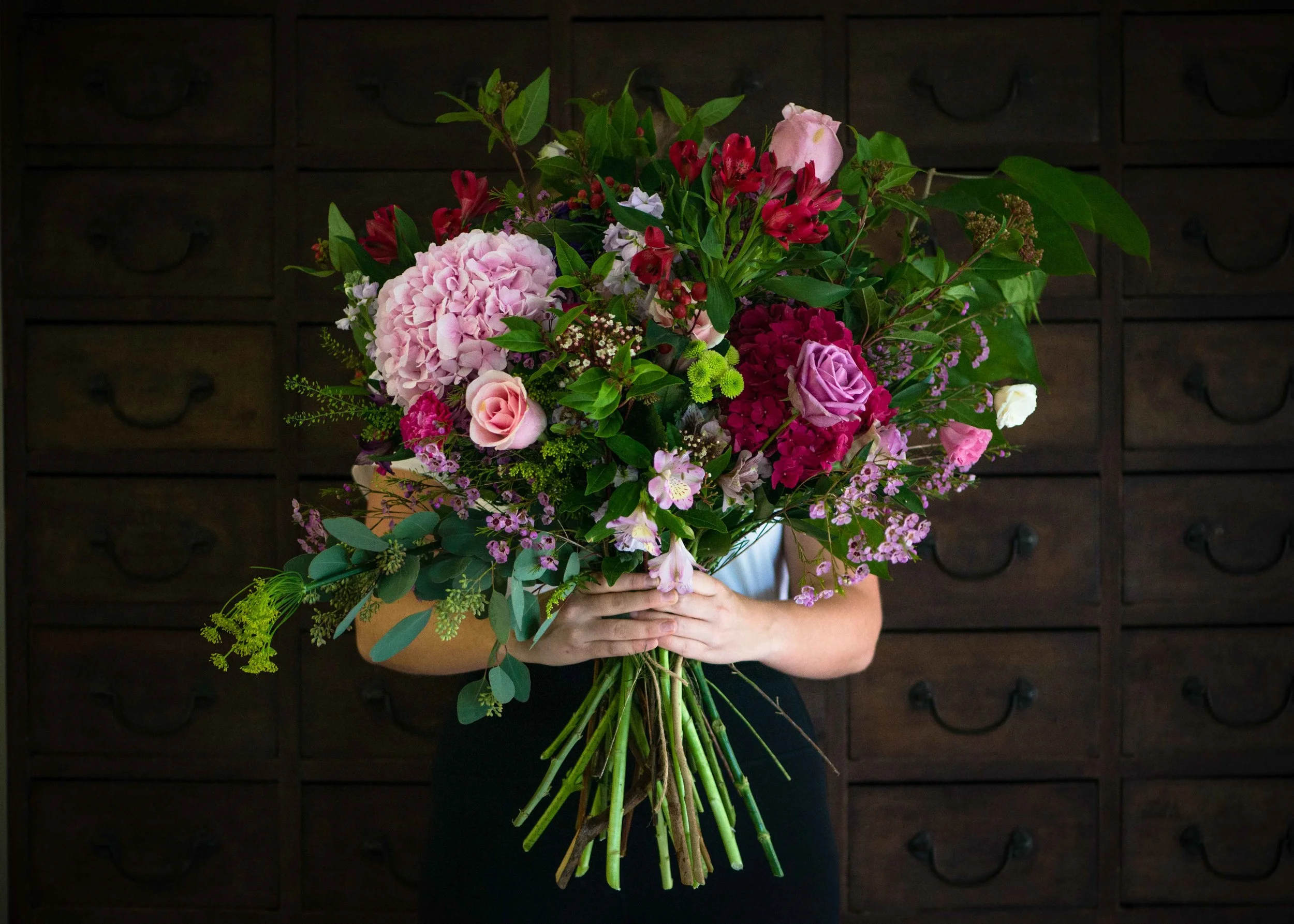 Dark bouquet holding.jpg