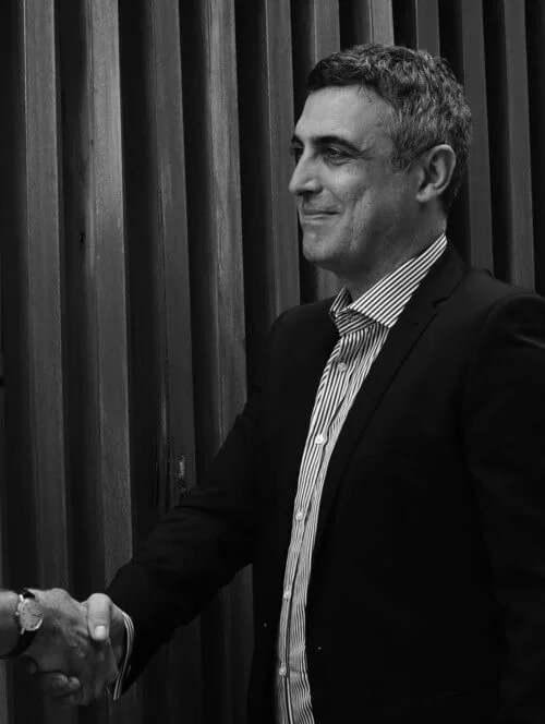 Australian Immigration Lawyer and Registered migration agent shakes hands with client