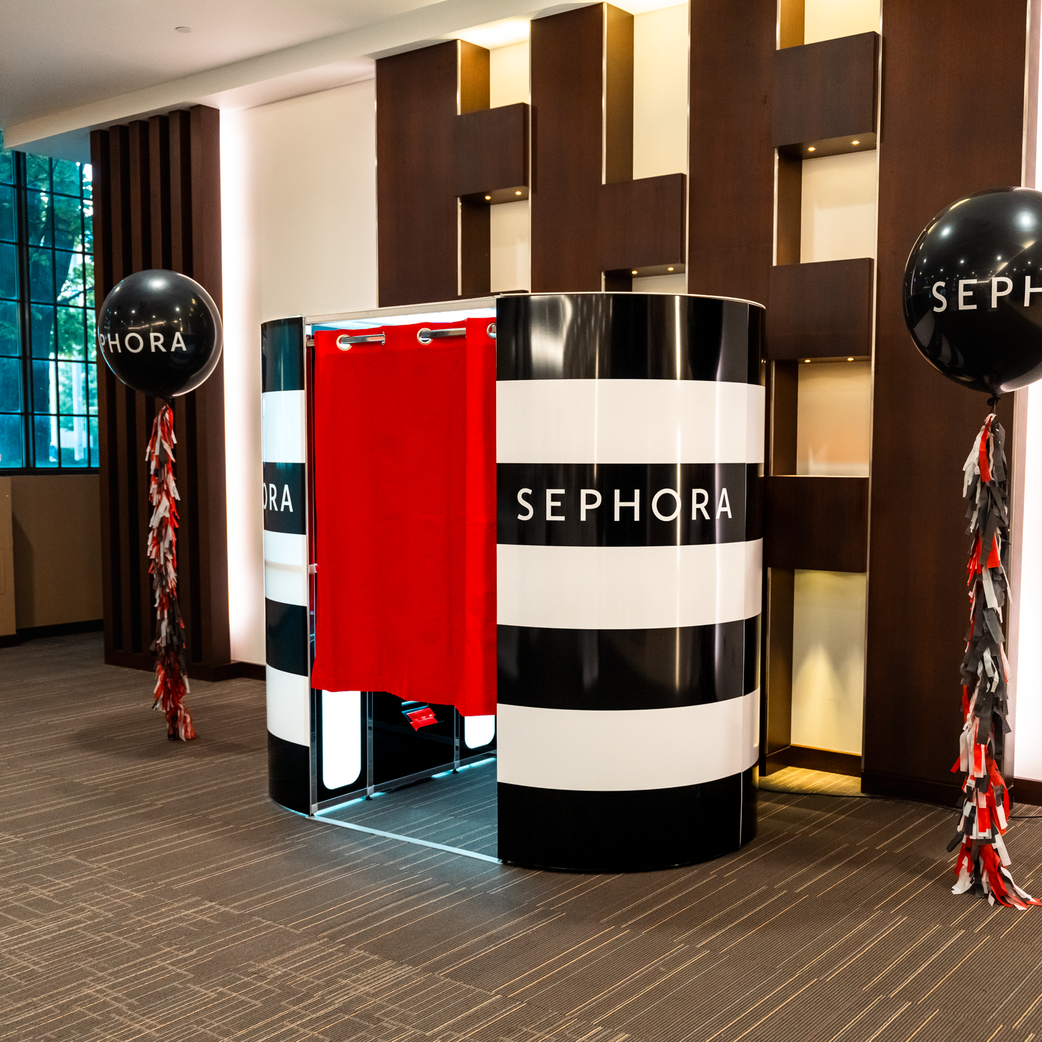 Snaptique Classic enclosed photo booth branded for Sephora at a Toronto event.