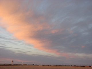 The water tower points to wind breaks
