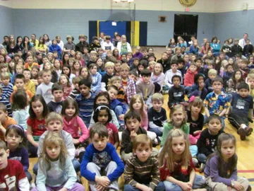 18 years ago it was me sitting in this crowd listening to guest speakers. Yes it is true...we would have liked to see a few more smiles.