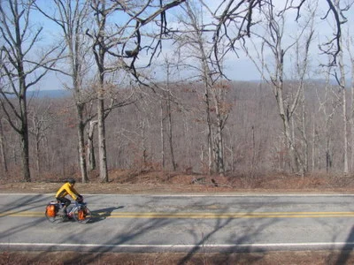 Views of distant mountains as we pedal along ridges