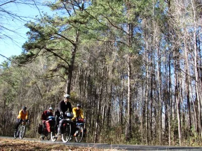 Paige and Chrystal bike us out of Columbia, SC and into the swamps